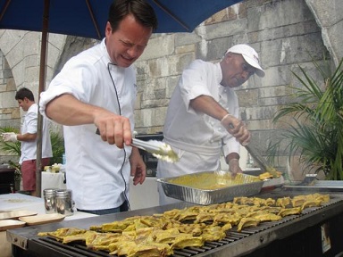 Famous South African chef and grill master Hugo Uys grills up a full South African BBQ (“Braai”) menu