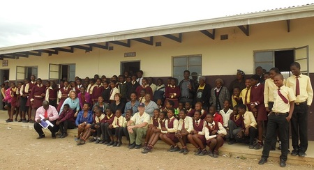 Travelers at a Jevu Secondary School classroom given by Collegiate Churches of New York.