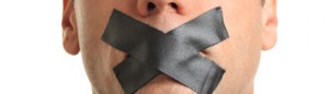 cropped-man-with-mouth-taped-shut