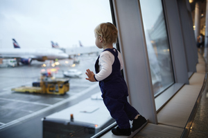 Boy looking at the planes